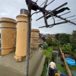Chimney stack and clay pots installation by roofing company in Woking