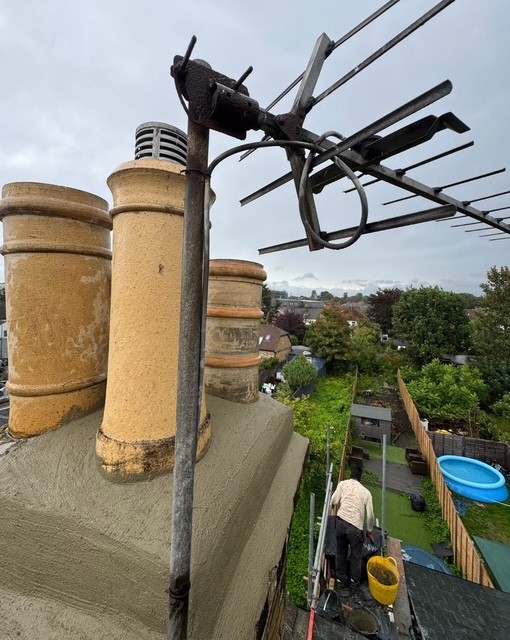 Chimney stack and clay pots installation by roofing company in Woking