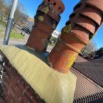 Clay chimney pots installation by roofing company